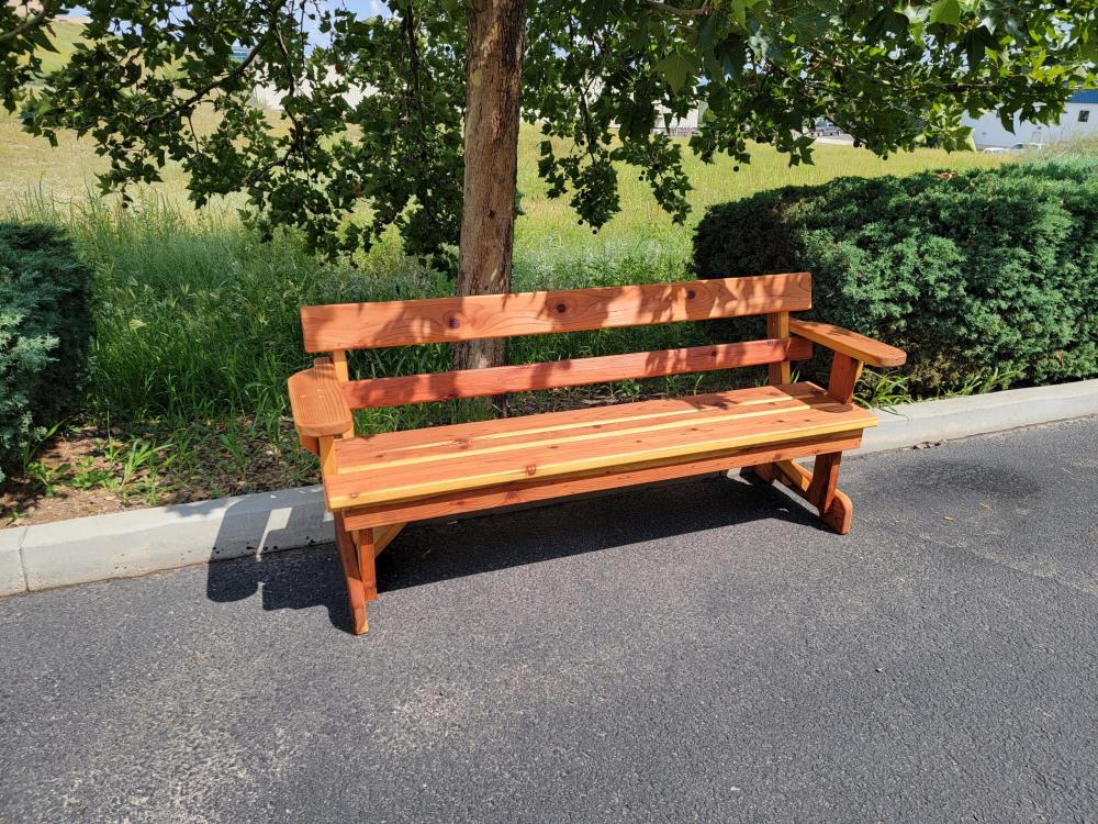 a wooden bench in a park