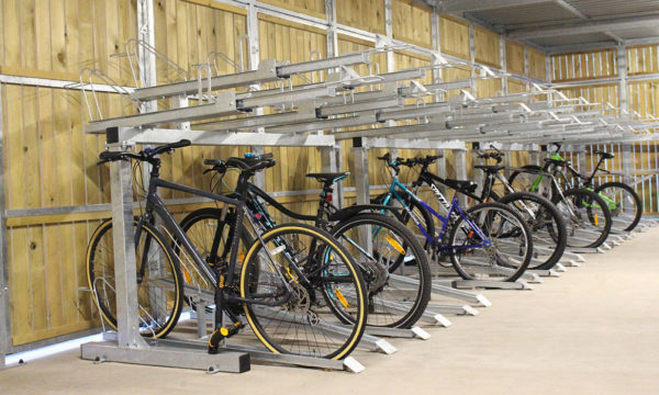 two tier bike rack indoors with bikes on