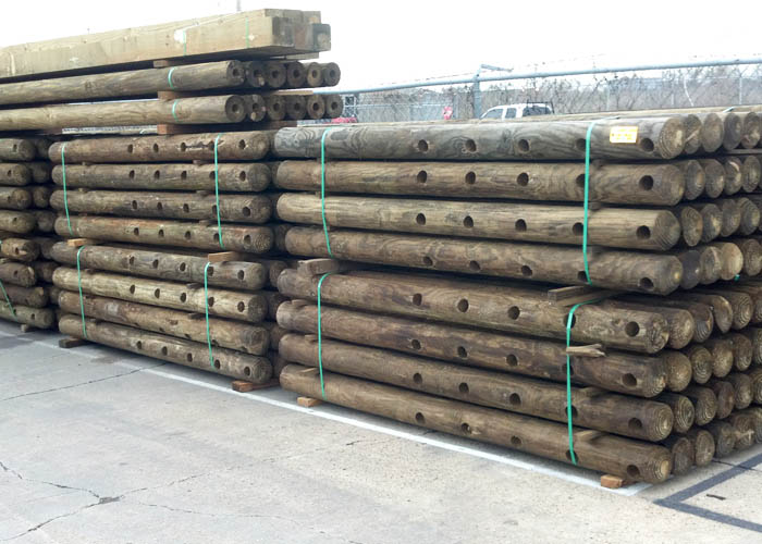 A pile of wooden posts