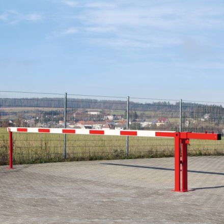 A closed boom barrier on an industrial site