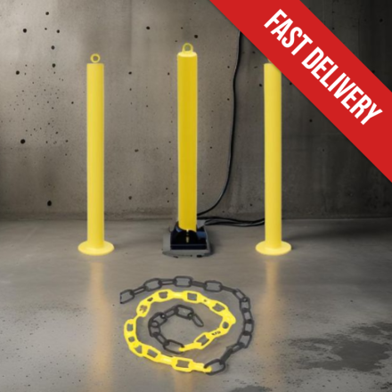 Image of three fold-down parking posts.
