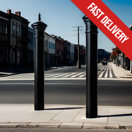 Two steel 'Manchester' bollards on the street
